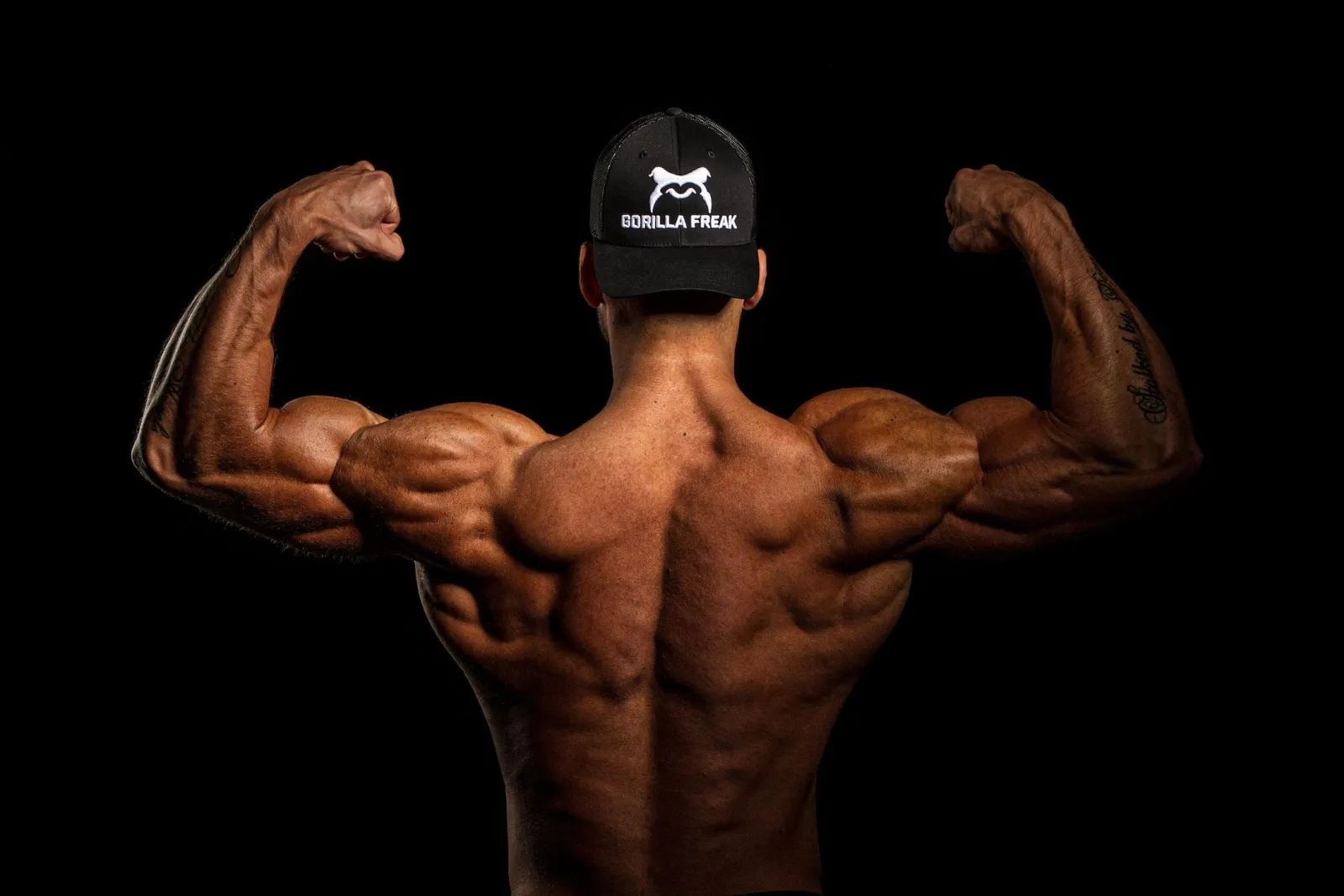 Muscular back and shoulders of a male athlete